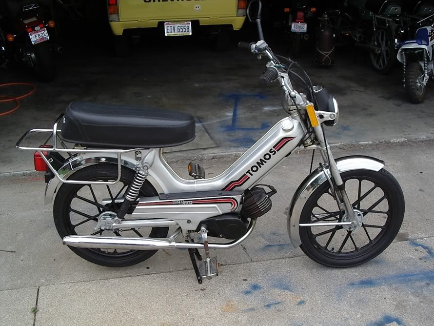 Moped like a bullet Downtown Lyrics Meaning